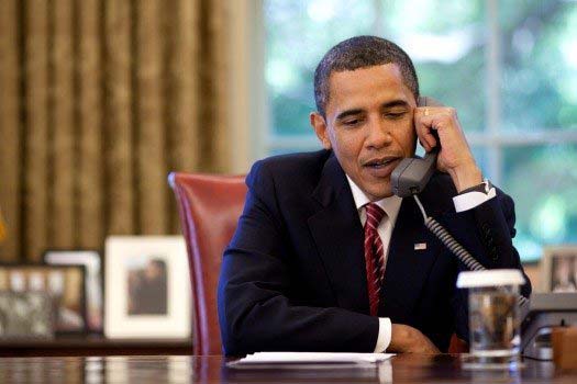 Barack Obama talking on phone