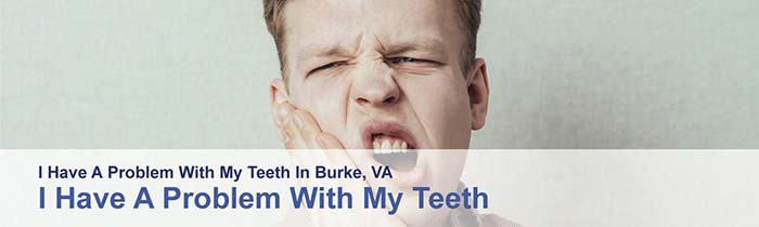 Man having toothache holding his teeth